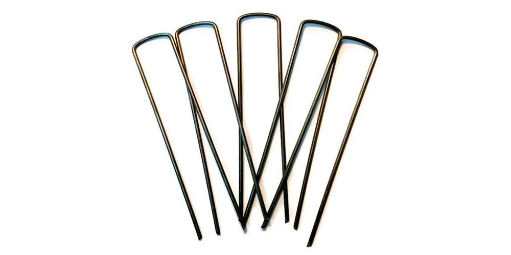 Five metal bobby pins, with black and bronze colors, arranged in a fan shape on a white background. They are slim and have rounded ends.