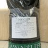 A large, black and green bag labeled "LAWN∙N∙LIFE" for natural turf products with a white label detailing its content, Fast Break 13% Proceed fertilizer.