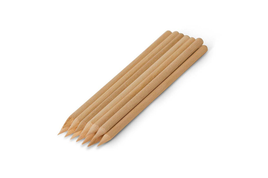 The image shows a set of wooden pencils aligned parallelly without erasers, displayed on a white background, with sharp tips pointing to one side.